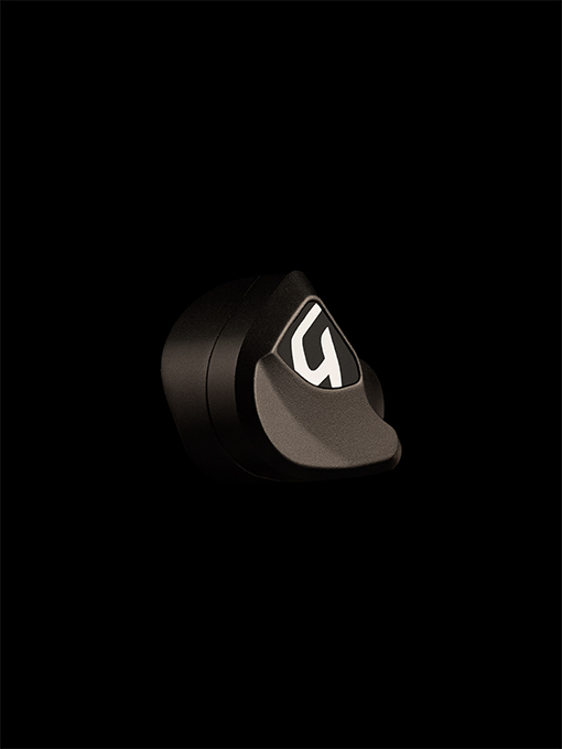 Nair product shown in a 3:4 angle on the black background to highlight its high-strength anodized finish. The image emphasizes the durable and refined surface treatment of the iem.