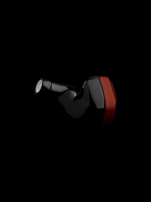 Side view of the Todi product highlighting the glossy finish of the body achieved through lacquer application. The image emphasizes the sleek and polished appearance of Todi in-ear monitors.