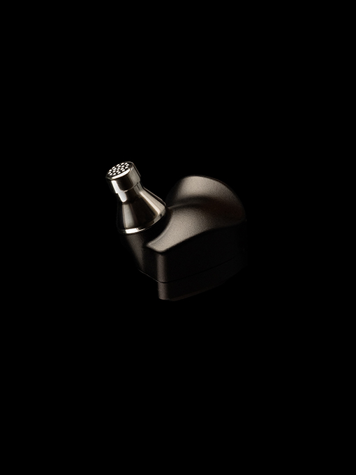 Nair in-ear on black background with nozzle aluminum highlighted